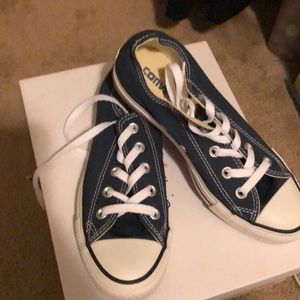 Navy blue converse tennis shoes